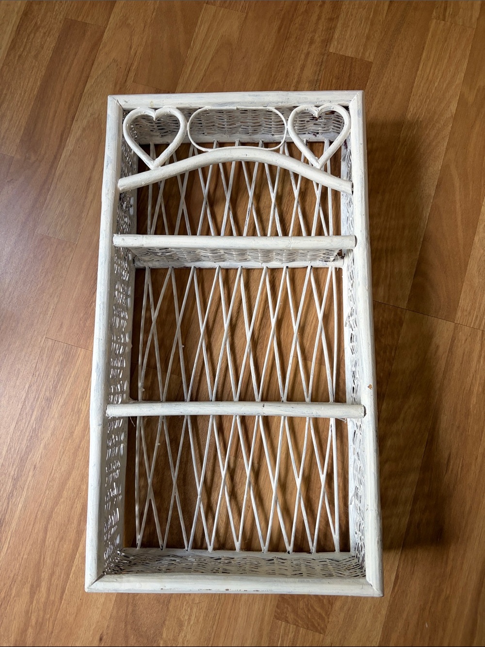 White Wicker Wall Shelf with Heart Accents